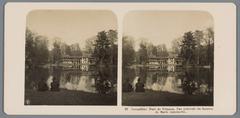 General view of Le Hameau de la Reine at Versailles, showing the architectural folly and lake in the Parc de Trianon