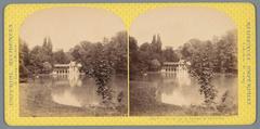 View of the lake and a house at Le Hameau de la Reine near the Petit Trianon, featuring the lake and the Seigneur's house