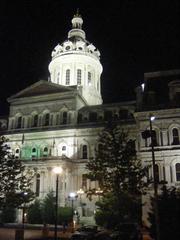 Night time view of Baltimore City Hall illuminated with lights