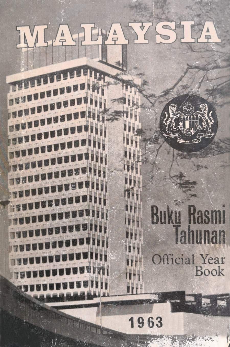Cover of the 1963 Official Malaysia Year Book showing the new Parliament complex