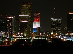 Bank of America Tower in downtown Miami lit up in red white and blue colors at night