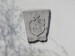 Keystone with relief of Ljubljana's coat of arms on Zois Mansion facade in Ljubljana