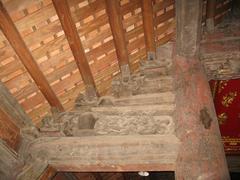 Dinh Bang communal house intricate roof decoration with dragon sculptures