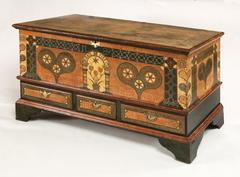Decorated pine chest from 1789 by John Bieber with Pennsylvania German folk art motifs such as hearts, tulips, and stars
