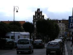 Fragment of a cityscape in Bartoszyce showing residential and commercial buildings