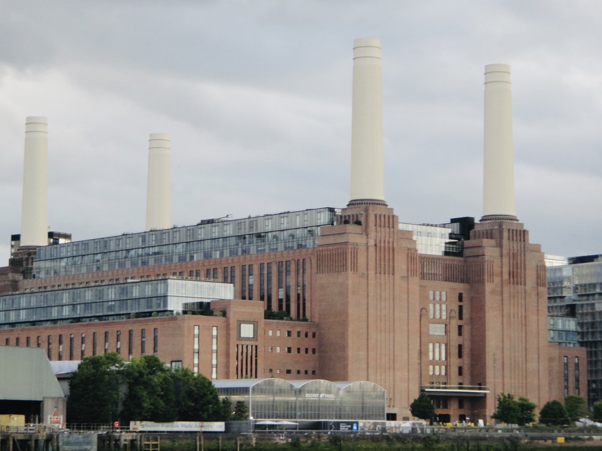Battersea Power Station viewed from the north bank of the River Thames with clear skies