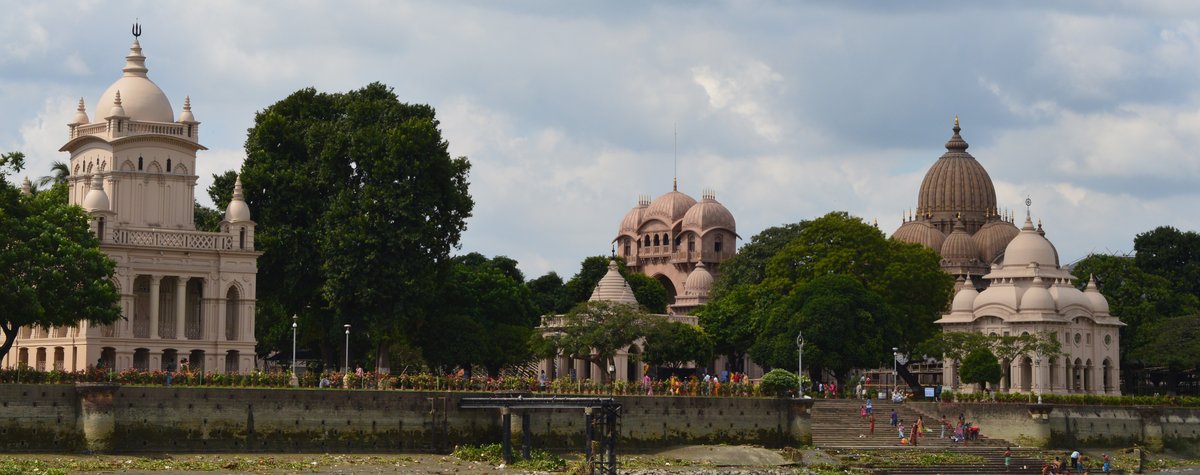Belur Math entrance with traditional architecture and a clear sky in Kolkata