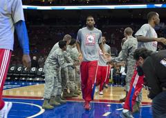 Philadelphia 76ers basketball team high-fiving U.S. military servicemembers at Wells Fargo Center