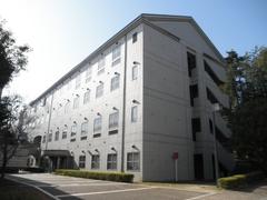 Exterior view of Nara University Research Building with glass and concrete architecture