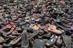 Shoes of concentration camp victims displayed at Auschwitz-Birkenau Museum during Second Gentleman Douglas Emhoff's tour