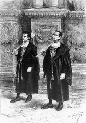 Two ceremonial mace bearers in traditional attire at the Ajuntament de Palma