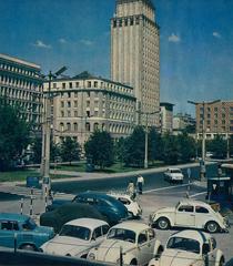 Plac Powstańców Warszawy in Warsaw in the 1960s showing busy street and tram tracks