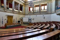 Interior of the Old Parliament House in Athens with historic artifacts and displays