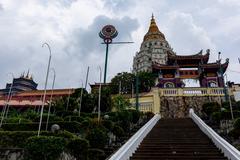 Kek Lok Si Temple in Penang surrounded by lush greenery and blue sky