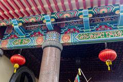 Two colorful lanterns glowing at night at Kek Lok Si temple
