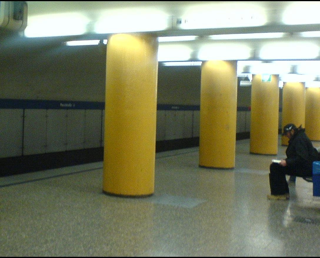 Munich subway station Poccistrasse platform with train and tracks