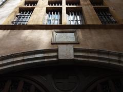 Plaque on the entrance of Saint Nizier Church in Lyon 2nd arrondissement