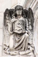 South bell tower facade with left angel statue at Saint-Nizier Church Lyon