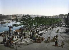 Quay des Célestins market at St. Antoine in Lyons, France with riverside view and historic buildings