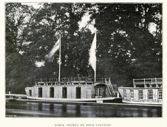 Historic rowing barge on River Thames at Christchurch Meadow Oxford with four college changing rooms