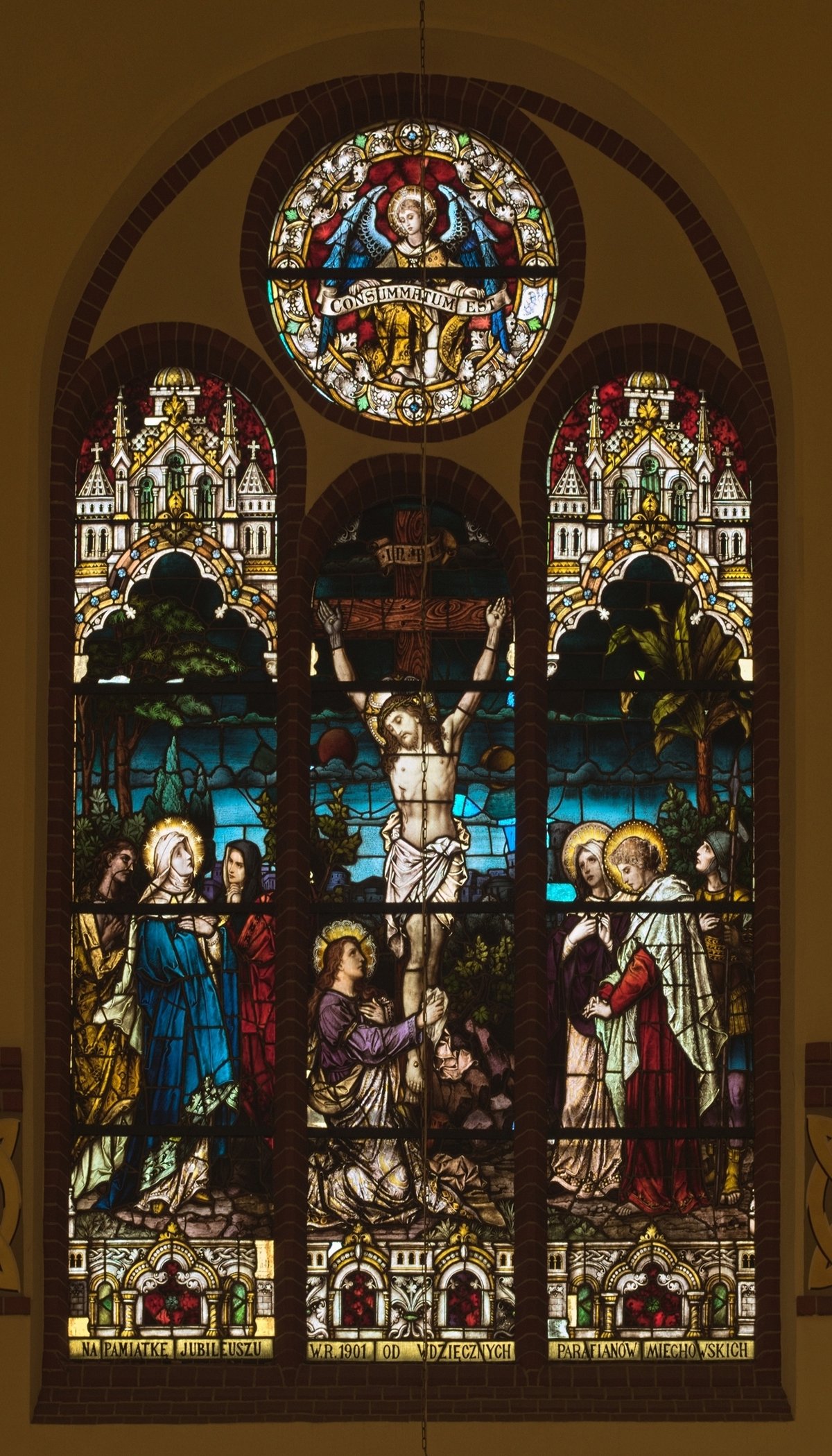 Stained glass window depicting the crucifixion scene inside the Holy Family Church in Bytom-Bobrek