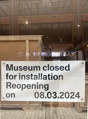 Musée d'art contemporain de Lyon entrance closed for refurbishment with English sign about closure until March 8 and upcoming triple exhibition in February 2024
