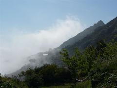 Sant Pere de Rodes monastery and Verdera castle in morning fog at Port de la Selva, Alt Empordà, Catalonia