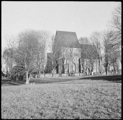 Exterior view of Gamla Uppsala Church and surrounding area from southwest