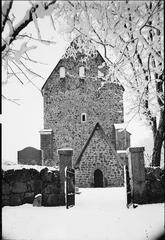Winter view of Gamla Uppsala Church exterior from the west
