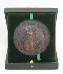 Close-up of a French medal related to the Peace Palace in The Hague, Netherlands