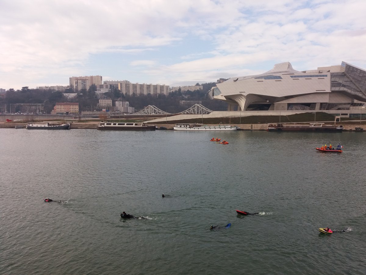 Swimming race arrival at Gerland, Lyon with swimmer wearing fins