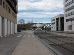 View of Rue Antonin Perrin leading towards Pont Raymond Barre in Lyon 7th arrondissement