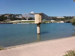 Pylon with entrance gate at Parc de Gerland alongside Rhône river quai