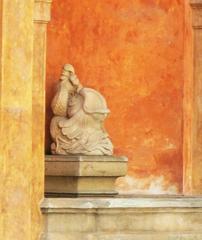 Historic fish-shaped fountain in the courtyard of the Tuscan Palace in Prague