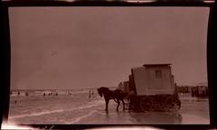 Horse drawn bathing wagon arriving on Scheveningen beach, Netherlands, 1913