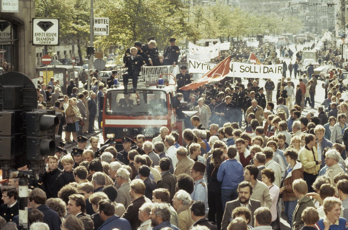 Dutch firefighters and civil servants demonstrating on Dam Square in Amsterdam against salary cuts in 1983