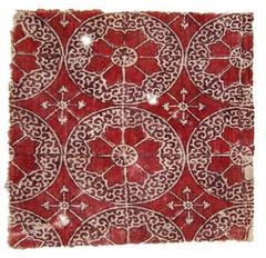 Indian cotton textile fragment with stamped and painted patterns from Fustat, Egypt, circa 1545-1645