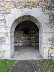 Door opening onto the fountain in Lyon's 5th arrondissement