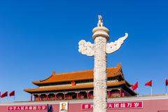 Statue with Tiananmen gate in the background