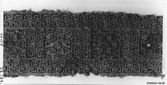 Ancient woven textile fragment from Ica with hook pattern