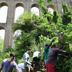 Sailors clearing environmental refuse at Caroline Aqueducts in Maddaloni, Italy