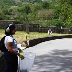 Sailors cleaning waste at Caroline Aqueduct during community service in Maddaloni