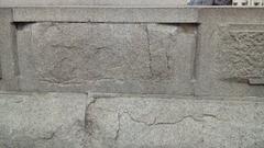 Damage at base of Nelson's Column caused by explosion during Armistice Day 1918 bonfire