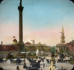 Trafalgar Square in London with Nelson's Column and surrounding buildings on a sunny day