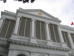 Front view of Istana, the official residence and office of the President of Singapore, surrounded by lush greenery