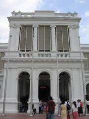 Exterior view of Istana, the official residence and office of the President of Singapore, surrounded by lush greenery