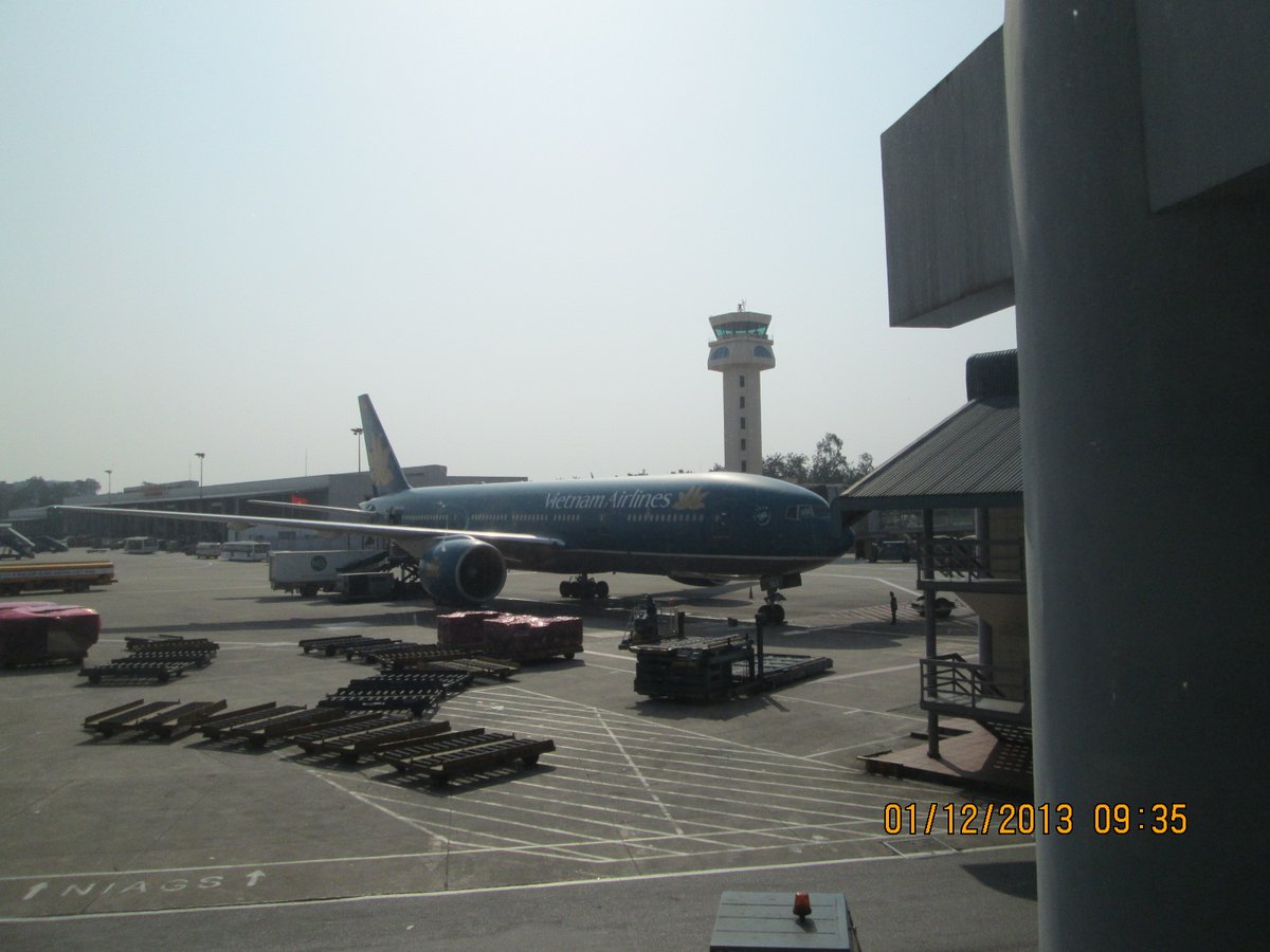 Noibai Airport terminal building exterior with clear sky