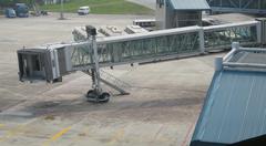 Jetway at Hanoi Airport with boarding bridge extending from terminal to airplane