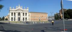 Piazza di Porta San Giovanni in Rome with historic buildings and clear blue sky