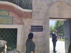 Workers mounting new name plate 'Kariye Mosque' in front of Chora, Istanbul